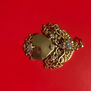 Angel with heart body pendant